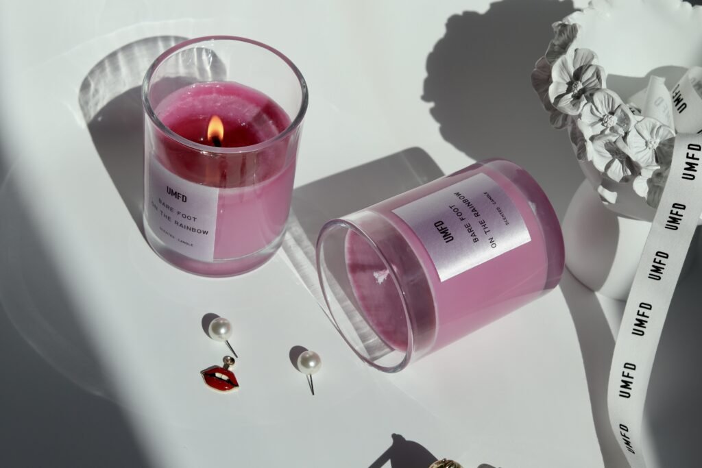 A minimal still life of fragrance and light, symbolizing the quiet emotion behind modern luxury branding.