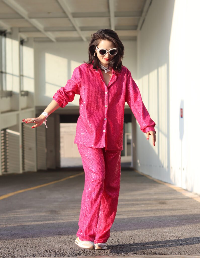 Minimalist flat-lay of fragrance and art book under soft daylight — visualizing Amanda Zhang’s concept of sensory worldview.